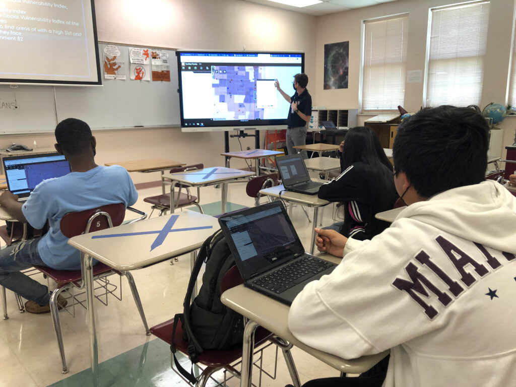 Lake Worth High School teacher Erik Johnson exploring social vulnerability on a GIS map with his students.